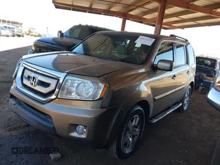 2011 Honda Pilot EX with VIN 5FNYF3H4XBB028225, listed as a IAAI auction lot 41873192 with 155,556 mi miles and . Bid and sale history available at carsss.com. Image 17.