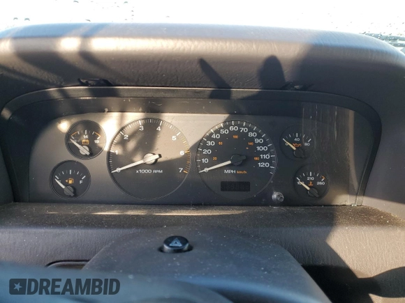 1999 Jeep Grand Cherokee Laredo z VIN 1J4GW58N1XC737706, wystawiony jako Copart lot #83107914 z przebiegiem Nie podano mil oraz Szkoda całkowita • Salvage title. Historia ofert i sprzedaży dostępna na DreamBid. Obrazek 9.