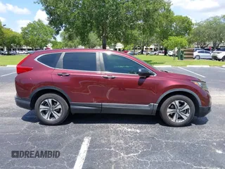 2019 Honda CR-V LX z VIN 2HKRW5H32KH409284, wystawiony jako IAAI lot #42469438 z przebiegiem 143 379 mil mil oraz . Historia ofert i sprzedaży dostępna na DreamBid. Obrazek 13.