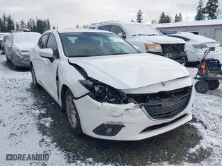 2016 Mazda Mazda3 i Grand Touring with VIN 3MZBM1N77GM319103, listed as a IAAI auction lot 41472772 with 82,833 mi miles. Bid and sale history available at carsss.com. Image 6.