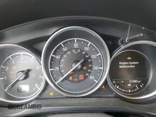 2018 Mazda CX-5 Touring z VIN JM3KFBCM2J0379190, wystawiony jako Copart lot #59233075 z przebiegiem 51 985 mil mil oraz Szkoda całkowita • Salvage title. Historia ofert i sprzedaży dostępna na DreamBid. Obrazek 9.