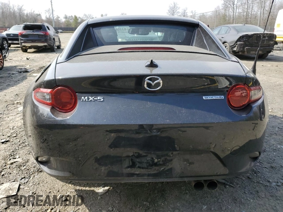 2021 Mazda MX-5 Miata Grand Touring with VIN JM1NDAM71M0451354, listed as a Copart auction lot 47756025 with 53,347 mi miles and Salvage title. Bid and sale history available at DreamBid. Image 6.