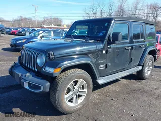 2018 Jeep Wrangler Unlimited Sahara with VIN 1C4HJXEG9JW263178, listed as a IAAI auction lot 41877138 with 82,723 mi miles. Bid and sale history available at carsss.com. Image 18.