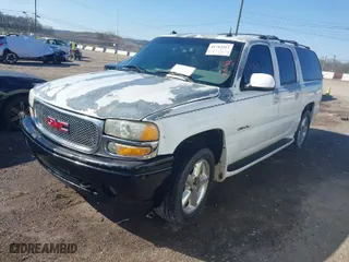 2003 GMC Yukon XL Denali with VIN 1GKFK66UX3J148600, listed as a IAAI auction lot 41712412 with NaN miles. Bid and sale history available at carsss.com. Image 2.