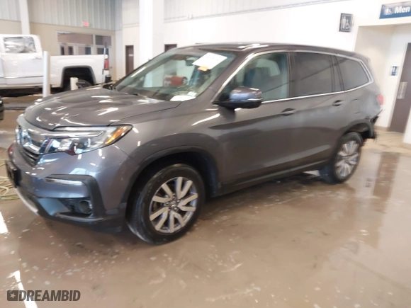 2021 Honda Pilot EX-L with VIN 5FNYF5H58MB005811, listed as a IAAI auction lot 41575276 with 167,544 mi miles. Bid and sale history available at carsss.com. Image 20.