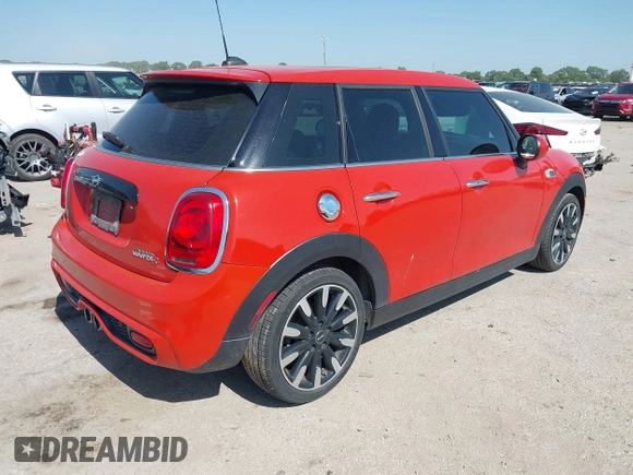 2019 MINI Hardtop 4 Door Cooper S with VIN WMWXU3C57K2B64946, listed as a IAAI auction lot 42240647 with 87,704 mi miles and . Bid and sale history available at DreamBid. Image 4.