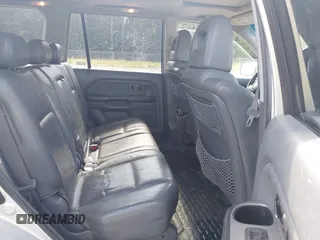 2005 Honda Pilot EX-L z VIN 2HKYF18665H558980, wystawiony jako IAAI lot #42316215 z przebiegiem 207 288 mil mil oraz . Historia ofert i sprzedaży dostępna na DreamBid. Obrazek 8.