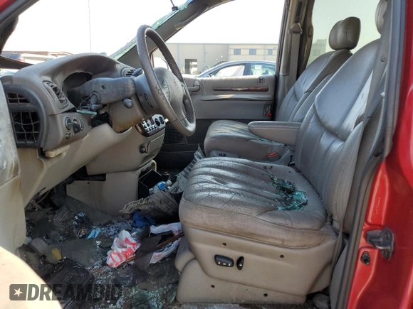 1999 Chrysler Town & Country LXi with VIN 1C4GP64L0XB536320, listed as a Copart auction lot 74194134 with Not Provided miles and Salvage Title. Bid and sale history available at carsss.com. Image 7.