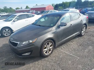 2013 Kia Optima EX with VIN 5XXGN4A78DG176690, listed as a IAAI auction lot 42196301 with 300,717 mi miles and . Bid and sale history available at DreamBid. Image 2.