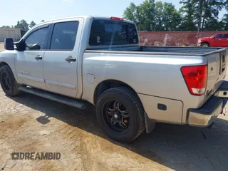 2012 Nissan Titan SV with VIN 1N6BA0ED8CN320723, listed as a IAAI auction lot 42642482 with 214,941 mi miles and . Bid and sale history available at DreamBid. Image 3.