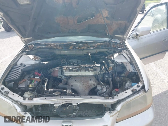 1999 Honda Accord LX with VIN JHMCG5642XC003361, listed as a IAAI auction lot 42270009 with 160,706 mi miles and . Bid and sale history available at DreamBid. Image 10.
