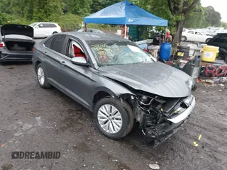 2019 Volkswagen Jetta S z VIN 3VWC57BU7KM232096, wystawiony jako IAAI lot #42317927 z przebiegiem 98 615 mil mil oraz . Historia ofert i sprzedaży dostępna na DreamBid. Obrazek 1.