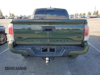 2021 Toyota Tacoma SR5 z VIN 3TMAZ5CN6MM157145, wystawiony jako Copart lot #51641085 z przebiegiem Nie podano mil oraz Szkoda całkowita • Salvage title. Historia ofert i sprzedaży dostępna na DreamBid. Obrazek 6.