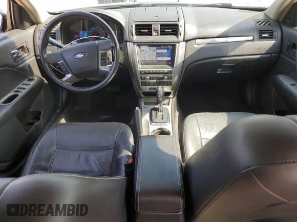2011 Ford Fusion Hybrid с VIN 3FADP0L37BR131390, выставлен на аукционе Copart как лот 56880435 с пробегом 240 955 миль миль и Чистый • Clean title. История ставок и продаж доступна на DreamBid. Изображение 8.