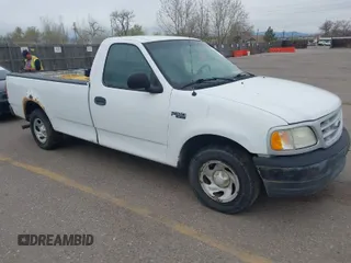 2003 Ford F-150 XL with VIN 1FTRF17273NA15637, listed as a IAAI auction lot 41952924 with 215,704 mi miles and . Bid and sale history available at DreamBid. Image 1.