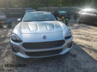 2018 FIAT 124 Spider Abarth z VIN JC1NFAEK4J0140443, wystawiony jako Copart lot #65664034 z przebiegiem Nie podano mil oraz Nie do naprawy. Historia ofert i sprzedaży dostępna na DreamBid. Obrazek 5.