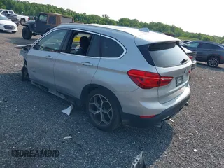 2018 BMW X1 xDrive28i with VIN WBXHT3C32J5K23486, listed as a IAAI auction lot 42387208 with 76,115 mi miles and . Bid and sale history available at DreamBid. Image 3.