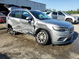 2019 Jeep Cherokee Latitude Plus with VIN 1C4PJLLB7KD197030, listed as a Copart auction lot 52854545 with 154,503 mi miles and Non Repairable. Bid and sale history available at carsss.com. Image 4.