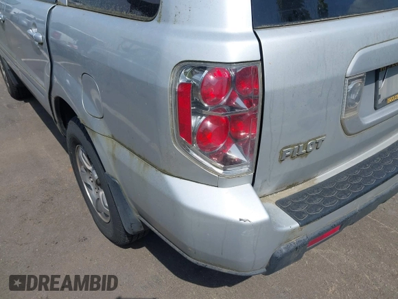 2006 Honda Pilot EX with VIN 2HKYF18446H000383, listed as a IAAI auction lot 42129875 with 206,723 mi miles and . Bid and sale history available at DreamBid. Image 6.
