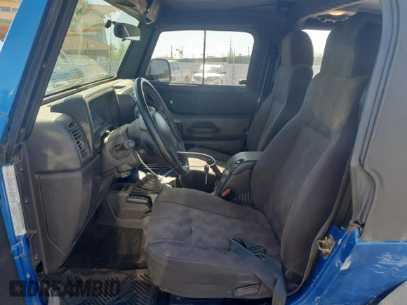 2003 Jeep Wrangler Sport with VIN 1J4FA49S53P350281, listed as a Copart auction lot 56634005 with 158,974 mi miles and Salvage title. Bid and sale history available at DreamBid. Image 7.
