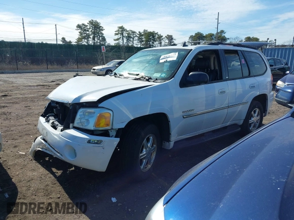 2006 GMC Envoy SLE with VIN 1GKDT13S662355509, listed as a IAAI auction lot 41628732 with 187,635 mi miles. Bid and sale history available at carsss.com. Image 2.