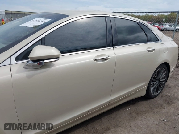 2014 Lincoln MKZ z VIN 3LN6L2JK7ER821385, wystawiony jako IAAI lot #42114154 z przebiegiem 141 480 mil mil oraz . Historia ofert i sprzedaży dostępna na DreamBid. Obrazek 15.