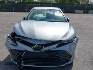 2019 Toyota Camry LE with VIN 4T1B11HK4KU249720, listed as a IAAI auction lot 41940728 with 35,891 mi miles and . Bid and sale history available at DreamBid. Image 6.