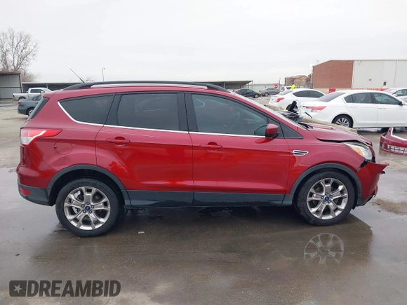 2015 Ford Escape SE with VIN 1FMCU0GXXFUC74470, listed as a IAAI auction lot 41419669 with 94,107 mi miles. Bid and sale history available at carsss.com. Image 13.