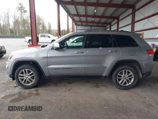 2018 Jeep Grand Cherokee Laredo E with VIN 1C4RJFAG7JC130313, listed as a IAAI auction lot 41969759 with 177,017 mi miles and . Bid and sale history available at DreamBid. Image 14.