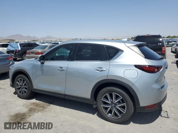 2018 Mazda CX-5 Grand Touring with VIN JM3KFBDM0J0377243, listed as a Copart auction lot 62199295 with 37,930 mi miles and Salvage title. Bid and sale history available at DreamBid. Image 2.