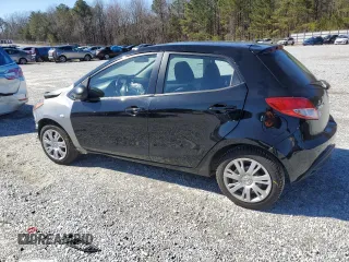 2012 Mazda 2 Sport with VIN JM1DE1KZ2C0149132, listed as a Copart auction lot 45177385 with 146,966 mi miles and Salvage Title. Bid and sale history available at DreamBid. Image 2.