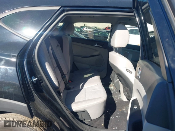 2021 Hyundai Tucson SE with VIN KM8J23A40MU334847, listed as a IAAI auction lot 41817556 with 63,000 mi miles and . Bid and sale history available at DreamBid. Image 8.