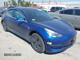 2020 Tesla Model 3 Standard Range Plus with VIN 5YJ3E1EA1LF590396, listed as a IAAI auction lot 41868089 with 51,278 mi miles. Bid and sale history available at carsss.com. Image 1.