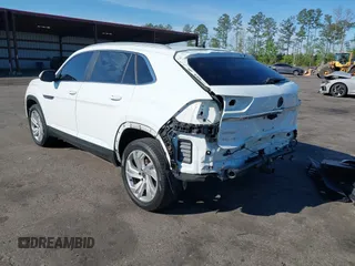 2021 Volkswagen Atlas SEL z VIN 1V2EE2CA2MC227667, wystawiony jako IAAI lot #41886405 z przebiegiem 41 928 mil mil oraz . Historia ofert i sprzedaży dostępna na DreamBid. Obrazek 3.
