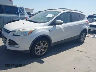 2013 Ford Escape SEL with VIN 1FMCU9H99DUA92213, listed as a IAAI auction lot 41853713 with 119,867 mi miles. Bid and sale history available at carsss.com. Image 2.