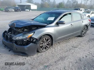 2018 Nissan Altima 2.5 SR with VIN 1N4AL3AP3JC251822, listed as a IAAI auction lot 41875517 with 135,808 mi miles. Bid and sale history available at carsss.com. Image 17.