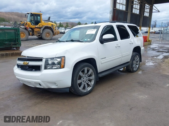 2013 Chevrolet Tahoe LT with VIN 1GNSKBE05DR293054, listed as a IAAI auction lot 41955877 with 192,474 mi miles and . Bid and sale history available at DreamBid. Image 18.