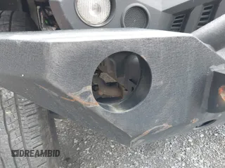 2018 Jeep Wrangler JK Unlimited Sport S with VIN 1C4BJWDG8JL895981, listed as a IAAI auction lot 42048316 with 95,457 mi miles. Bid and sale history available at carsss.com. Image 6.
