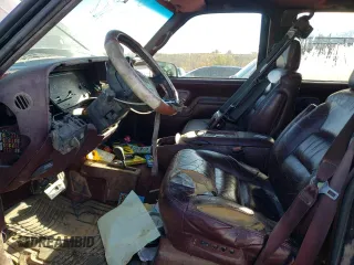 1997 GMC Suburban z VIN 3GKFK16R3VG511306, wystawiony jako Copart lot #78504814 z przebiegiem 287 079 mil mil oraz Szkoda całkowita • Salvage title. Historia ofert i sprzedaży dostępna na DreamBid. Obrazek 7.