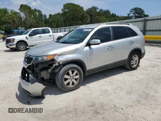 2013 Kia Sorento LX with VIN 5XYKT4A24DG311650, listed as a Copart auction lot 55963645 with 218,385 mi miles and Salvage title. Bid and sale history available at DreamBid. Image 1.