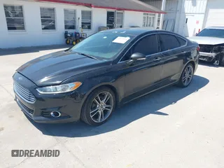 2014 Ford Fusion Titanium with VIN 3FA6P0K9XER216551, listed as a IAAI auction lot 42037004 with 113,857 mi miles and . Bid and sale history available at DreamBid. Image 17.