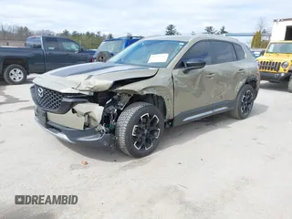 2023 Mazda CX-50 Meridian Edition z VIN 7MMVABXY3PN130331, wystawiony jako IAAI lot #41793745 z przebiegiem 32 162 mil mil oraz . Historia ofert i sprzedaży dostępna na DreamBid. Obrazek 2.