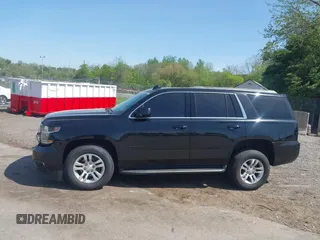 2020 Chevrolet Tahoe LT with VIN 1GNSKBKCXLR255963, listed as a IAAI auction lot 42127845 with 46,746 mi miles and . Bid and sale history available at DreamBid. Image 14.