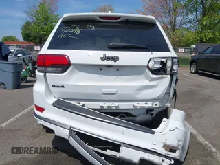 2021 Jeep Grand Cherokee Overland with VIN 1C4RJFCG6MC592296, listed as a IAAI auction lot 42170899 with 56,553 mi miles and . Bid and sale history available at DreamBid. Image 16.