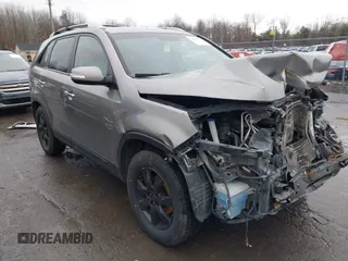 2013 Kia Sorento LX with VIN 5XYKT3A62DG349522, listed as a IAAI auction lot 38563127 with 127,205 mi miles and . Bid and sale history available at carsss.com. Image 1.