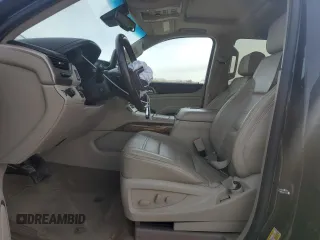 2015 GMC Yukon Denali with VIN 1GKS1CKJ1FR303049, listed as a Copart auction lot 82435514 with 100,693 mi miles and Salvage Title. Bid and sale history available at carsss.com. Image 7.