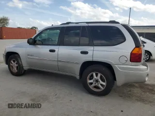 2006 GMC Envoy SLT with VIN 1GKDS13S662139632, listed as a Copart auction lot 47387245 with 246,803 mi miles and Salvage Title. Bid and sale history available at carsss.com. Image 2.
