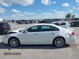 2016 Chevrolet Impala LTZ with VIN 2G1WC5E36G1103156, listed as a IAAI auction lot 42253613 with 170,000 mi miles and . Bid and sale history available at DreamBid. Image 14.