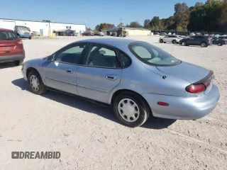 1998 Ford Taurus LX z VIN 1FAFP52U5WA273382, wystawiony jako Copart lot #77102854 z przebiegiem 73 014 mil mil oraz Szkoda całkowita • Salvage title. Historia ofert i sprzedaży dostępna na DreamBid. Obrazek 2.