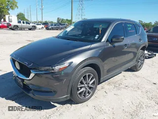 2018 Mazda CX-5 Grand Touring with VIN JM3KFBDM8J0314925, listed as a IAAI auction lot 41825917 with 70,027 mi miles. Bid and sale history available at carsss.com. Image 2.